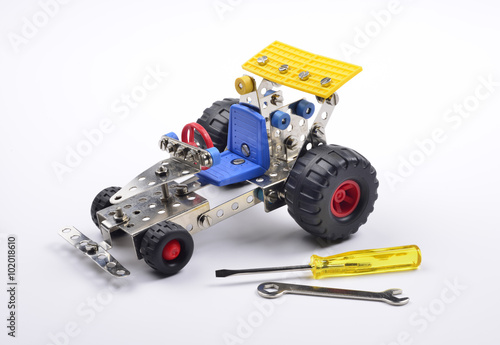 Toy car assembled with metal pieces