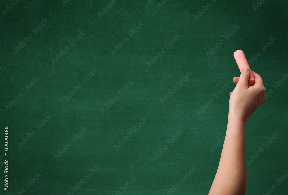 Hand writing on clean blackboard Hand writing on clean blackboard