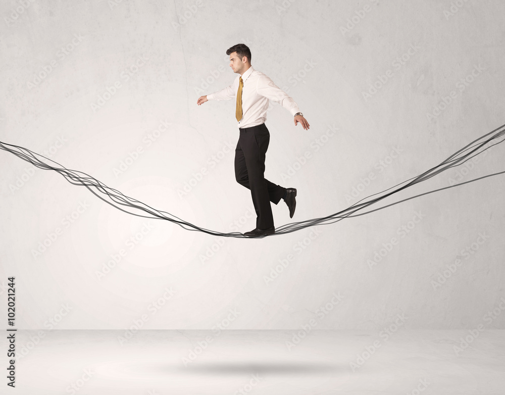 Sales person balancing on drawn ropes Sales person balancing on drawn ropes