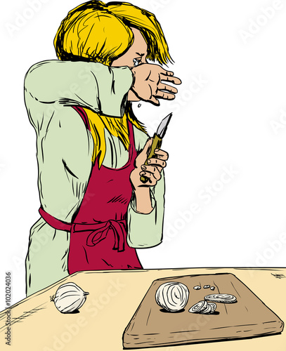 Blond woman crying as she cuts onions