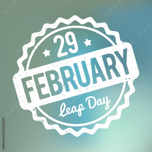 29 February Leap Day rubber stamp white on a blue bokeh fog background.