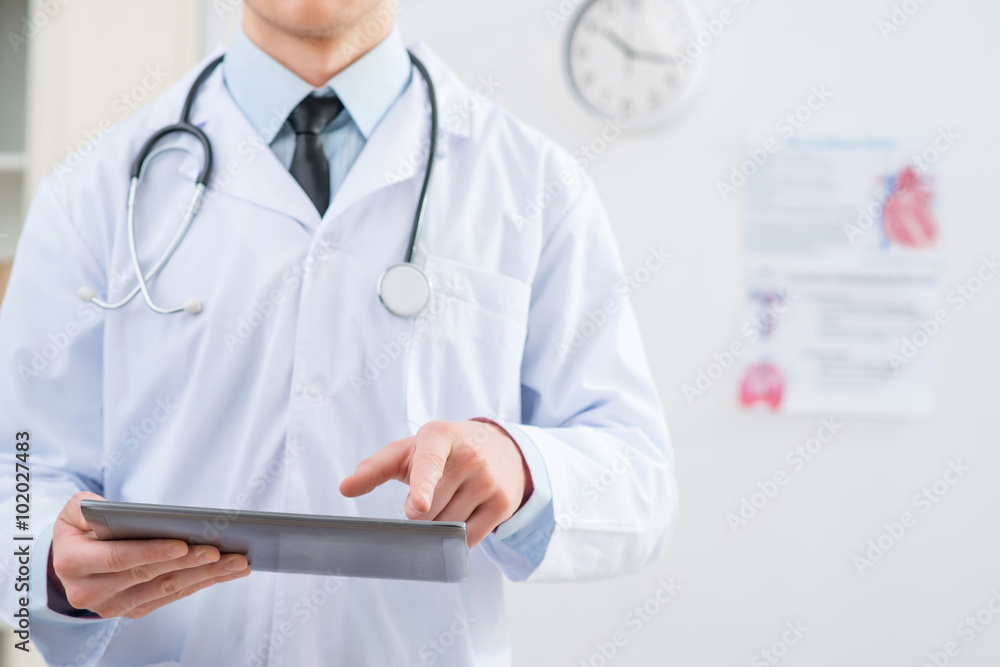 Professional doctor holding tablet Professional doctor holding tablet
