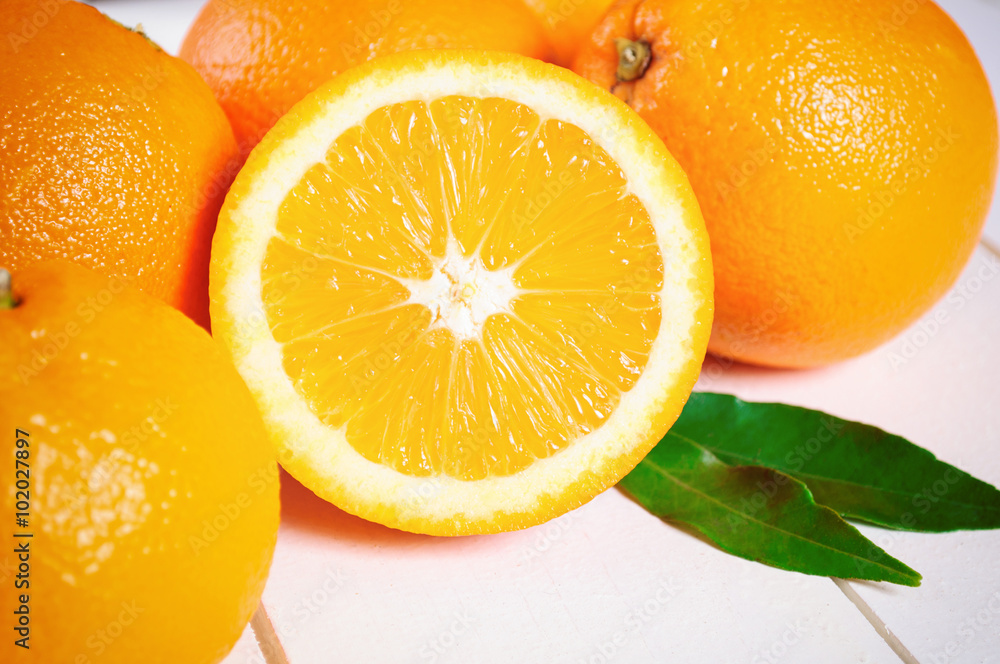 Orange fruit on white table Orange fruit on white table