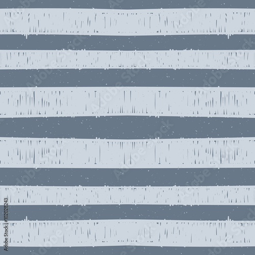 Seamless pattern of hand drawn blue stripes.