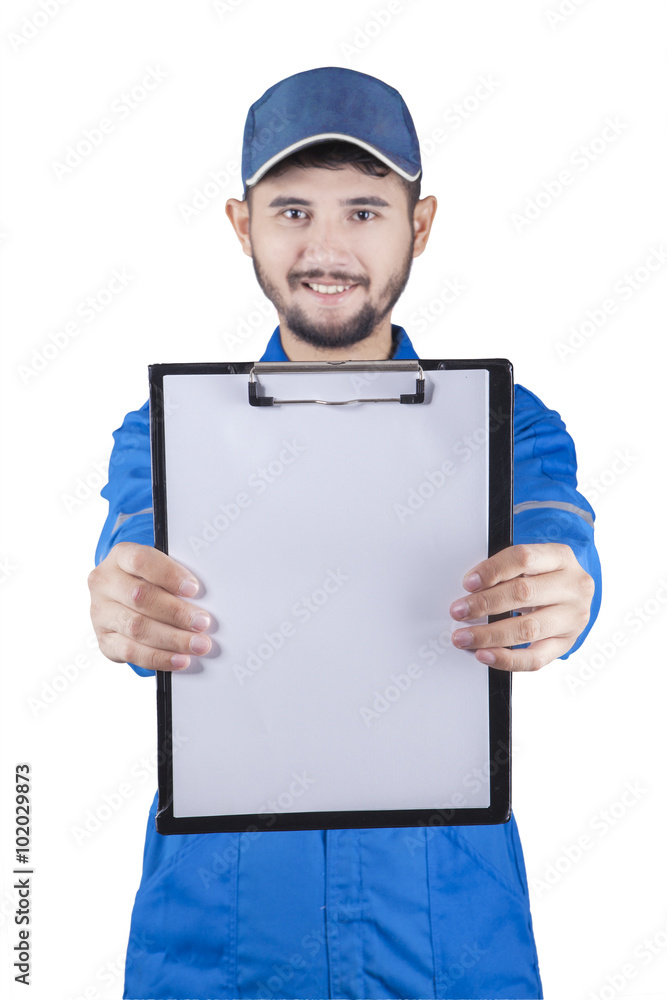 Mechanic showing empty clipboard Mechanic showing empty clipboard