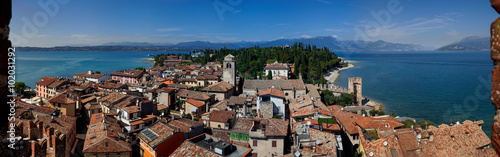 Lake Garda, Sirmione, Dolomites in Italy. Beautiful panoramic view on Lake Garda, Sirmione and Italian Alps from Scaliger Castle (Lombardy, Italy). photo