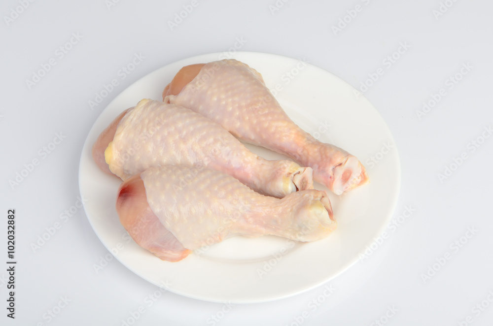chicken legs on the plate with parsley chicken legs on the plate with parsley