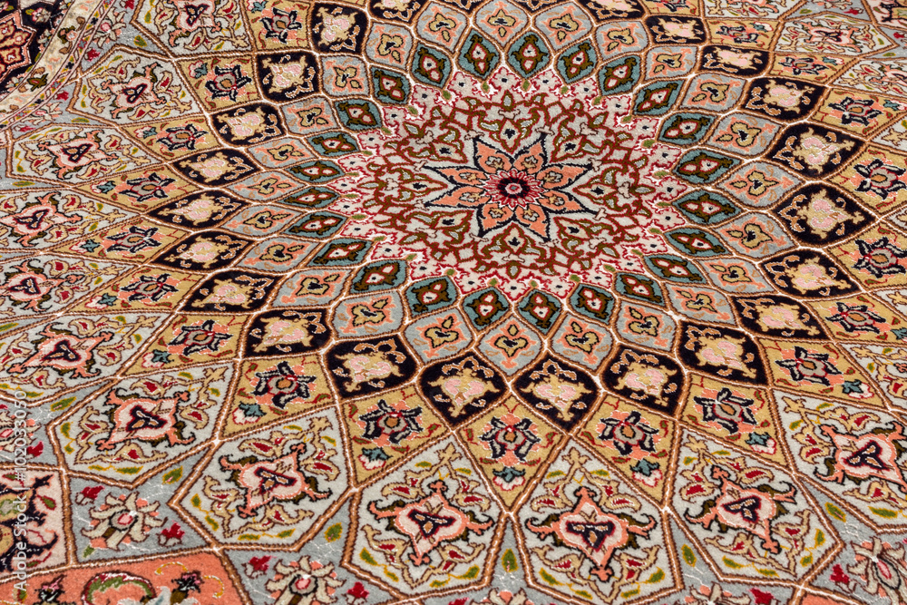 Close up of a very fine persian Gonbad Tabriz oriental carpet