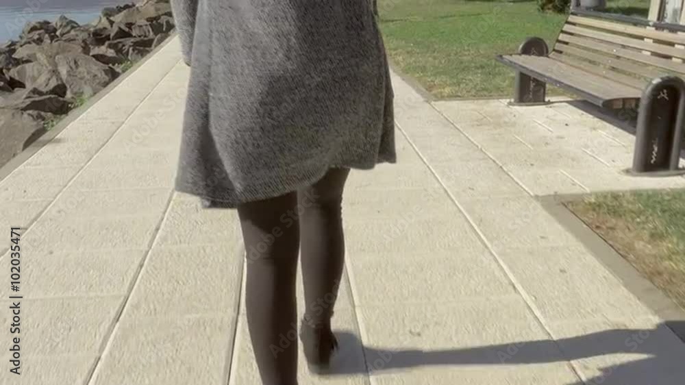 Closeup of feet of woman walking taking cell phone taking picture selfie 4K Closeup of feet of woman walking taking cell phone taking picture selfie 4K
