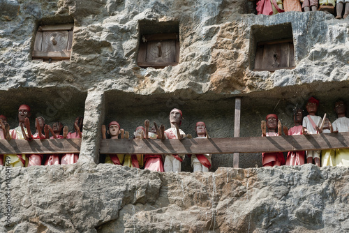 Wooden Statues Of Tau Tau. Lemo is cliffs old burial site in Tana Toraja. South Sulawesi, Indonesia