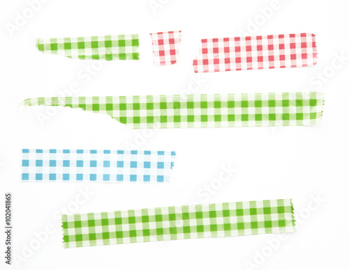 Collection of different stripes of masking tapes on white background for scrapbook