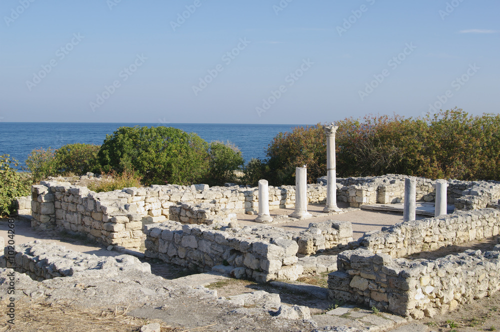 ancient city Chersonese, ruins of basilica, Black sea on back plane, Sevastopol, Crimea, Russia 