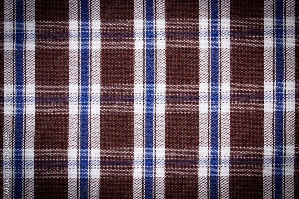 Colorful checkered shirt as background texture Colorful checkered shirt as background texture