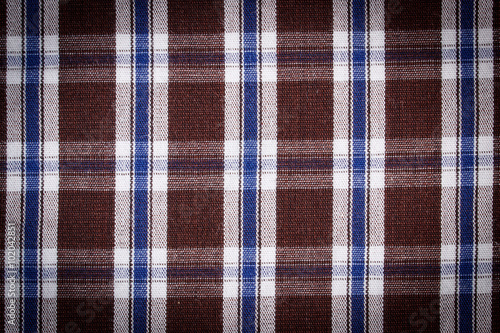 Colorful checkered shirt as background texture © ratmaner