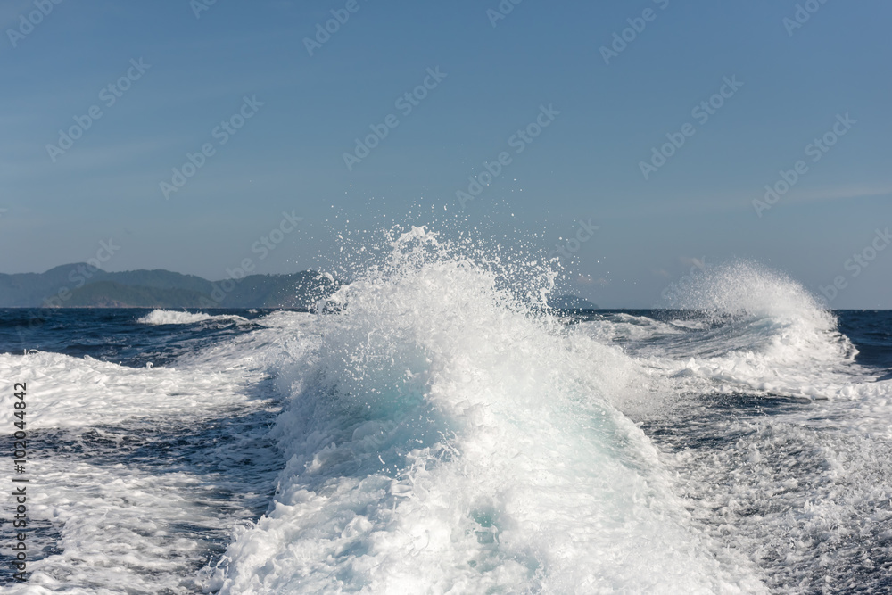 Fototapeta premium Background water surface behind of fast moving motor boat