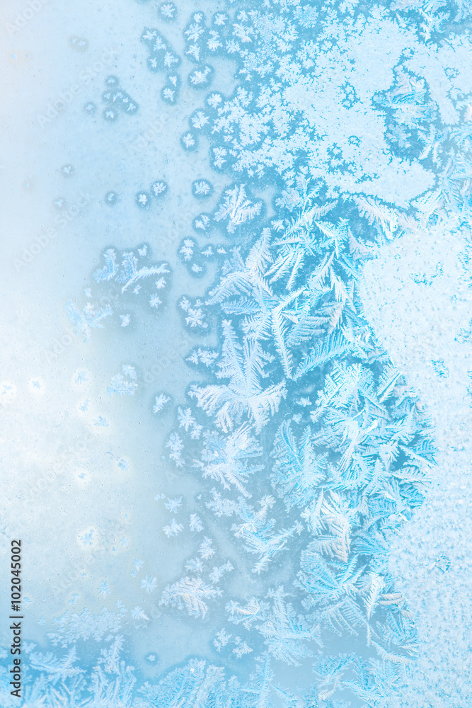 abstract winter ice texture on window, festive background, close