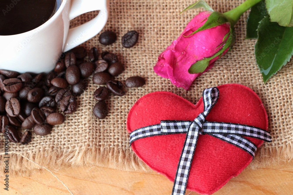 Coffee with coffee beans and red hearts. Coffee with coffee beans and red hearts.