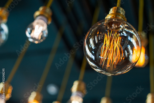 Canvas-taulu Round glowing tungsten lamp