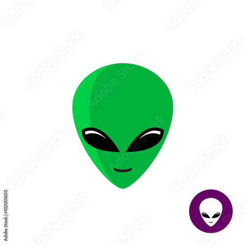 Alien face logo. Planet UFO intruder with big green head and huge eyes.