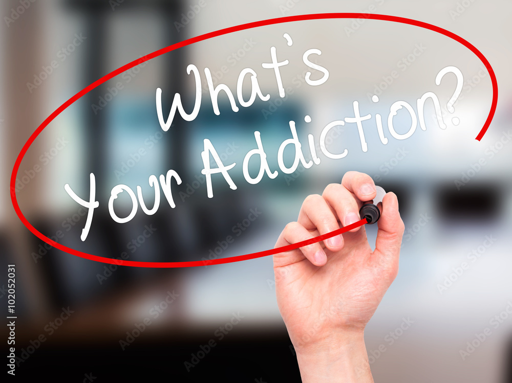 Man Hand writing What's your Addiction? with black marker on vis Man Hand writing What's your Addiction? with black marker on vis