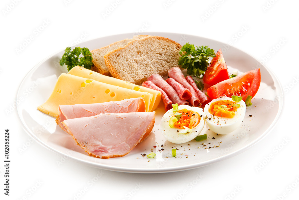 Breakfast - boiled egg, ham, cheese and vegetables Breakfast - boiled egg, ham, cheese and vegetables
