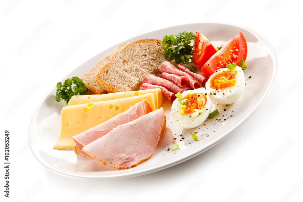 Breakfast - boiled egg, ham, cheese and vegetables Breakfast - boiled egg, ham, cheese and vegetables