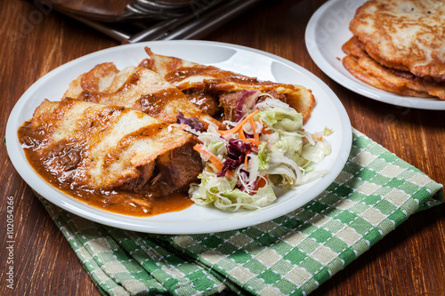 Potato pancakes with meat stew