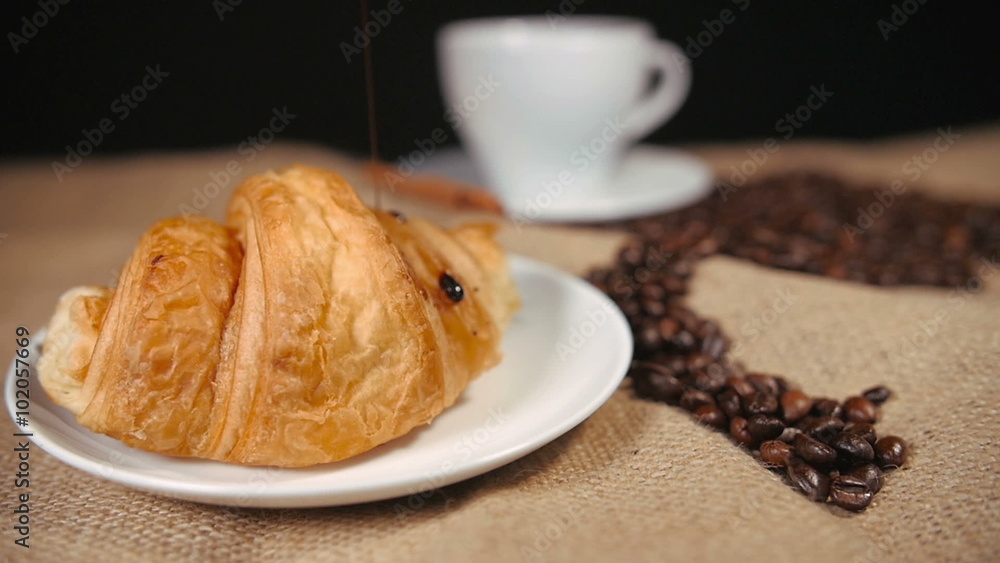 Pouring a Chocolate on Croissant Pouring a Chocolate on Croissant