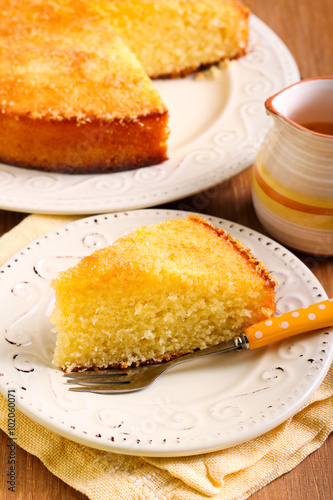 Coconut citrus syrup cake