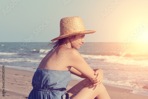 Woman on the beach © Sondem