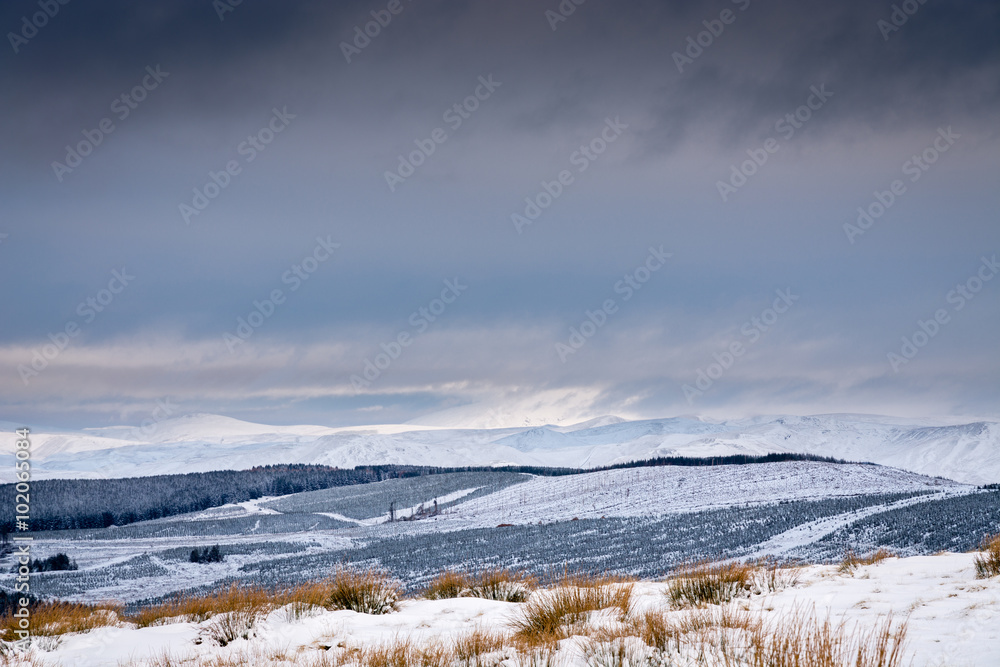 The Cheviot under snow and cloud from Carter Bar