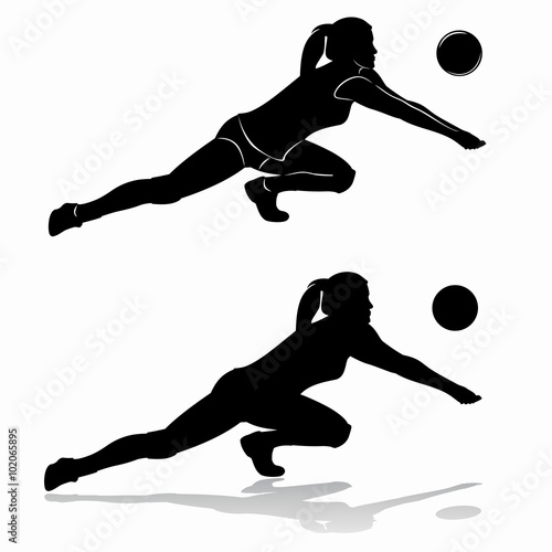 Silhouette of woman playing volleyball