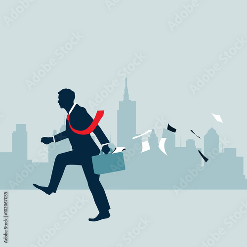 Businessman walking with city background