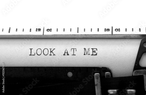 Typewriter. Typing text: look at me
