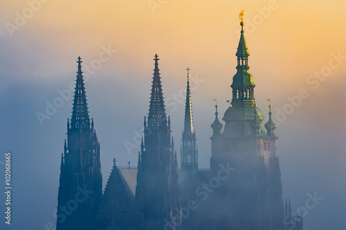 Beautiful detailed view of Prague Castle towers during sunrise
