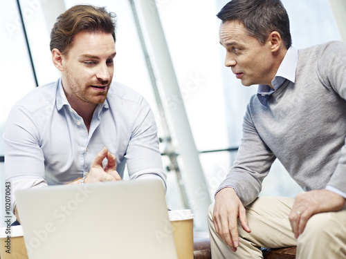 corporate people discussing business in office photo