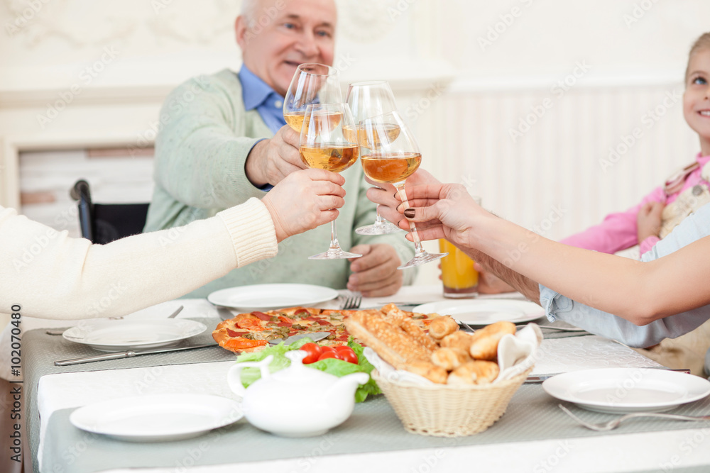 Pretty friendly family has a dinner at home Pretty friendly family has a dinner at home