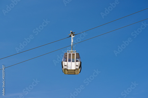 cable car on blue sky background