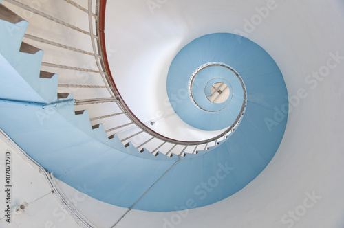 look up to the blue spiral staircase of Lynvig Lighthouse, NÃ?Â¸rre Lyngvig, Jutland, Denmark, Europe