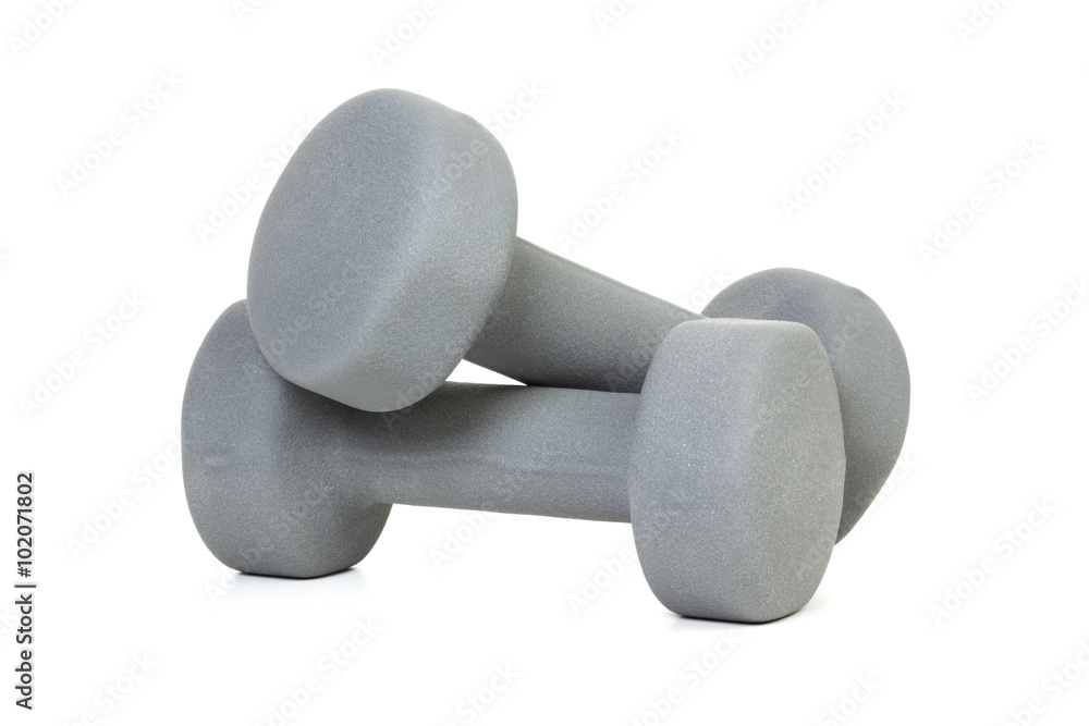 Pair of grey dumbbells isolated. Grey rubber coated dumbbells isolated on white background Pair of grey dumbbells isolated. Grey rubber coated dumbbells isolated on white background