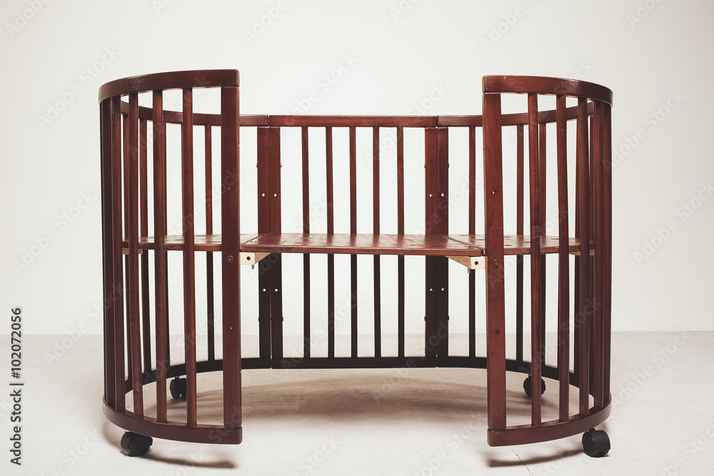 Elegant expensive bed for newborn baby. Luxury decorations of apartments Elegant expensive bed for newborn baby. Luxury decorations of apartments