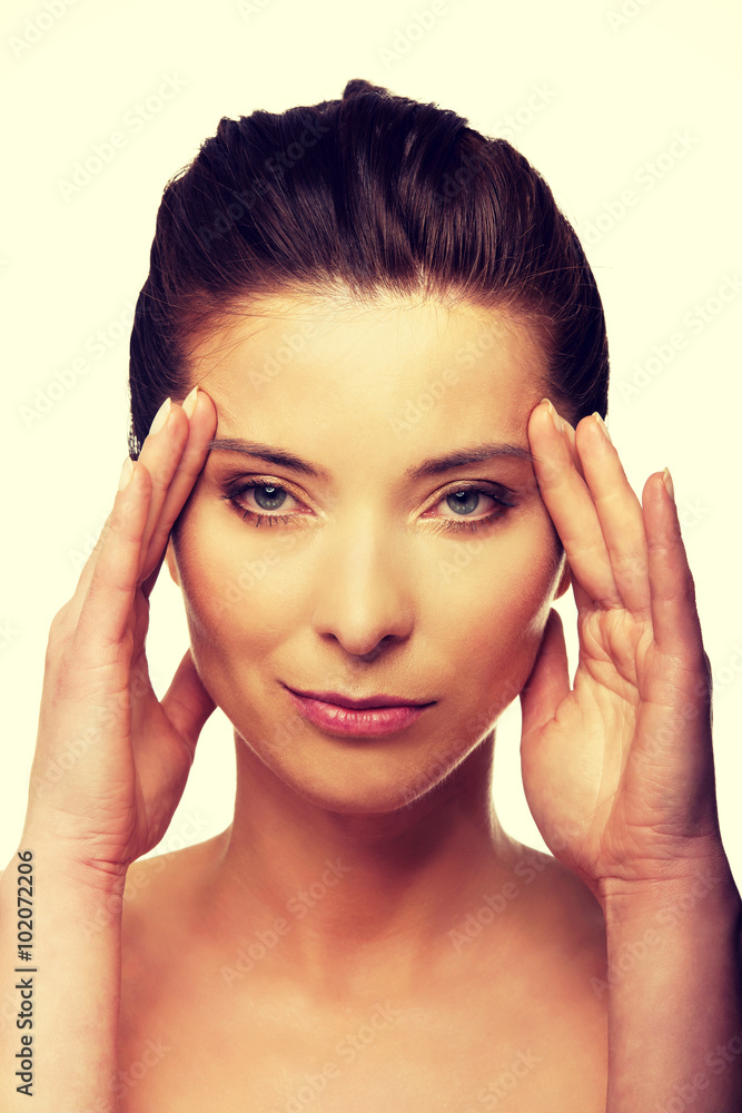 Spa woman with make up touching her face. Spa woman with make up touching her face.