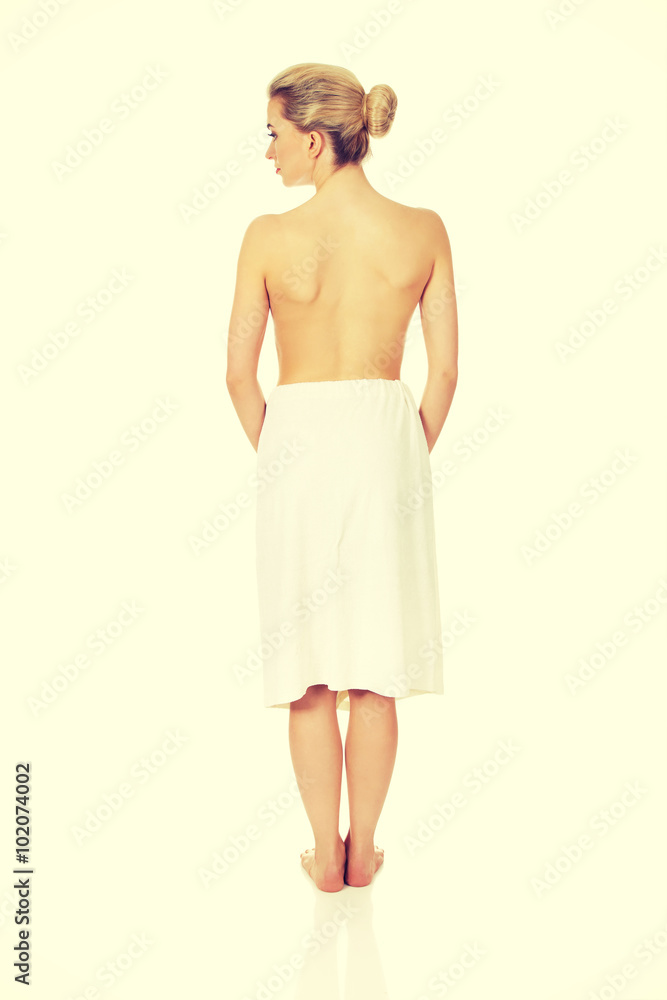 Fototapeta premium Young topless woman back after spa or bath.