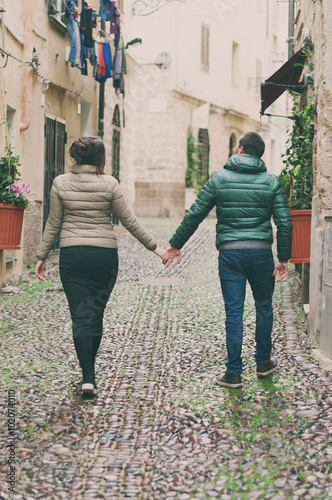 Young couple in love in the small italian city © nolonely