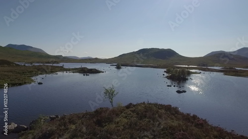 Stunning drone shot in Scotland of Lochan na h-Achlaise by Rannoch Moor on the A83 towards Glen Coe
 photo