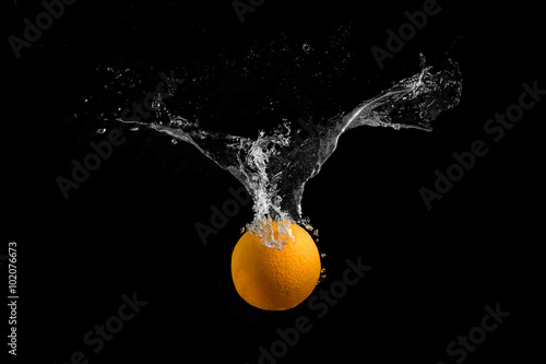 Orange on a black background