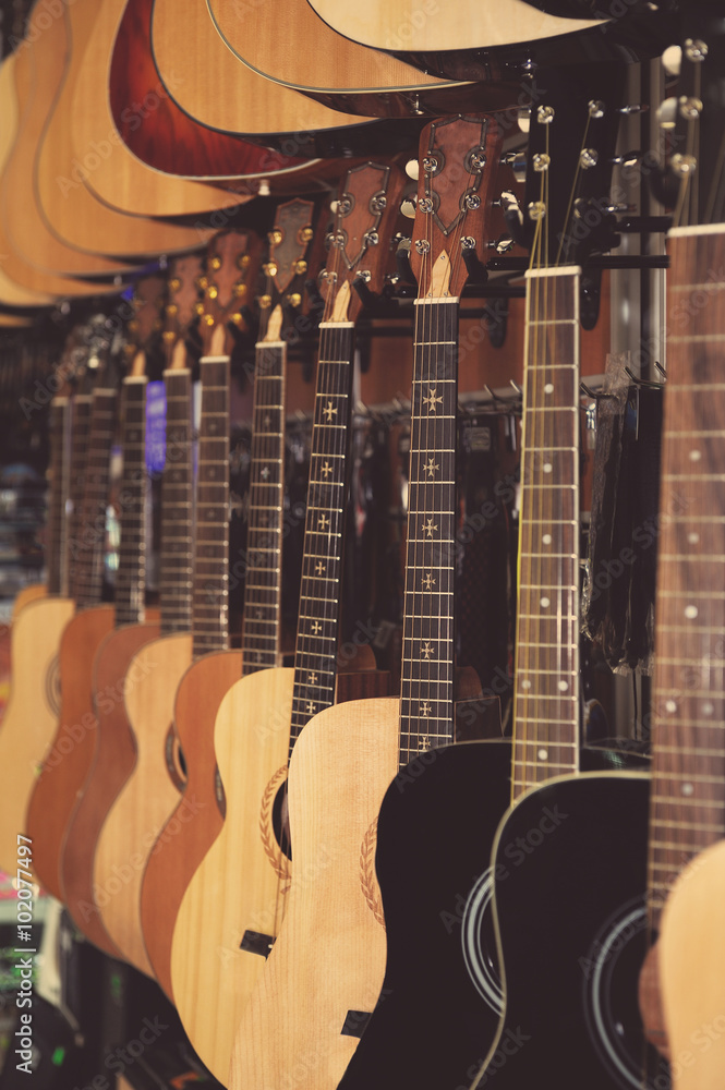 Obraz premium Guitars in music store