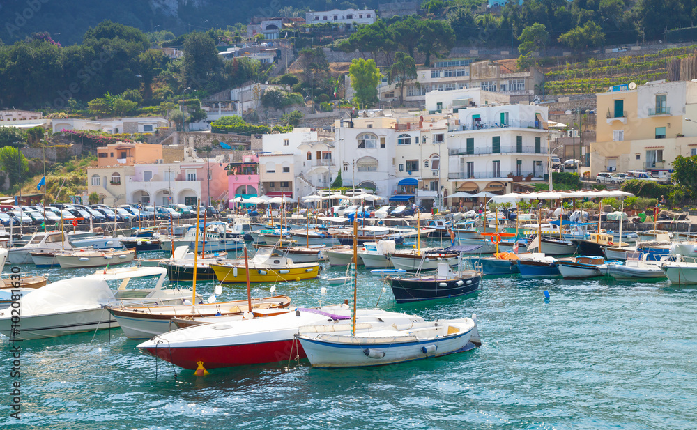  Capri island, Italy. Colorful houses and motorboats