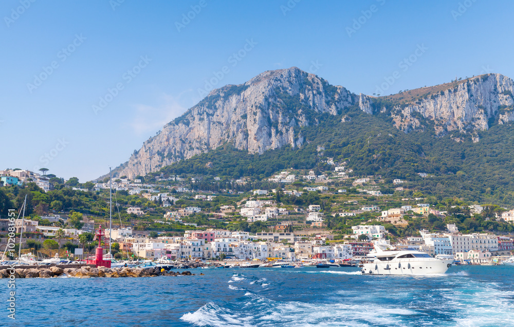 Port of Capri, Italy. Pleasure boats go near breakwater