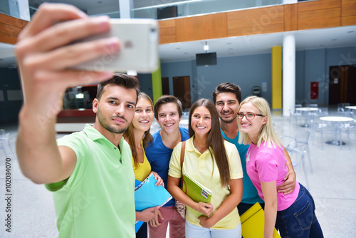 happy students group make selfie in classroom © blicsejo
